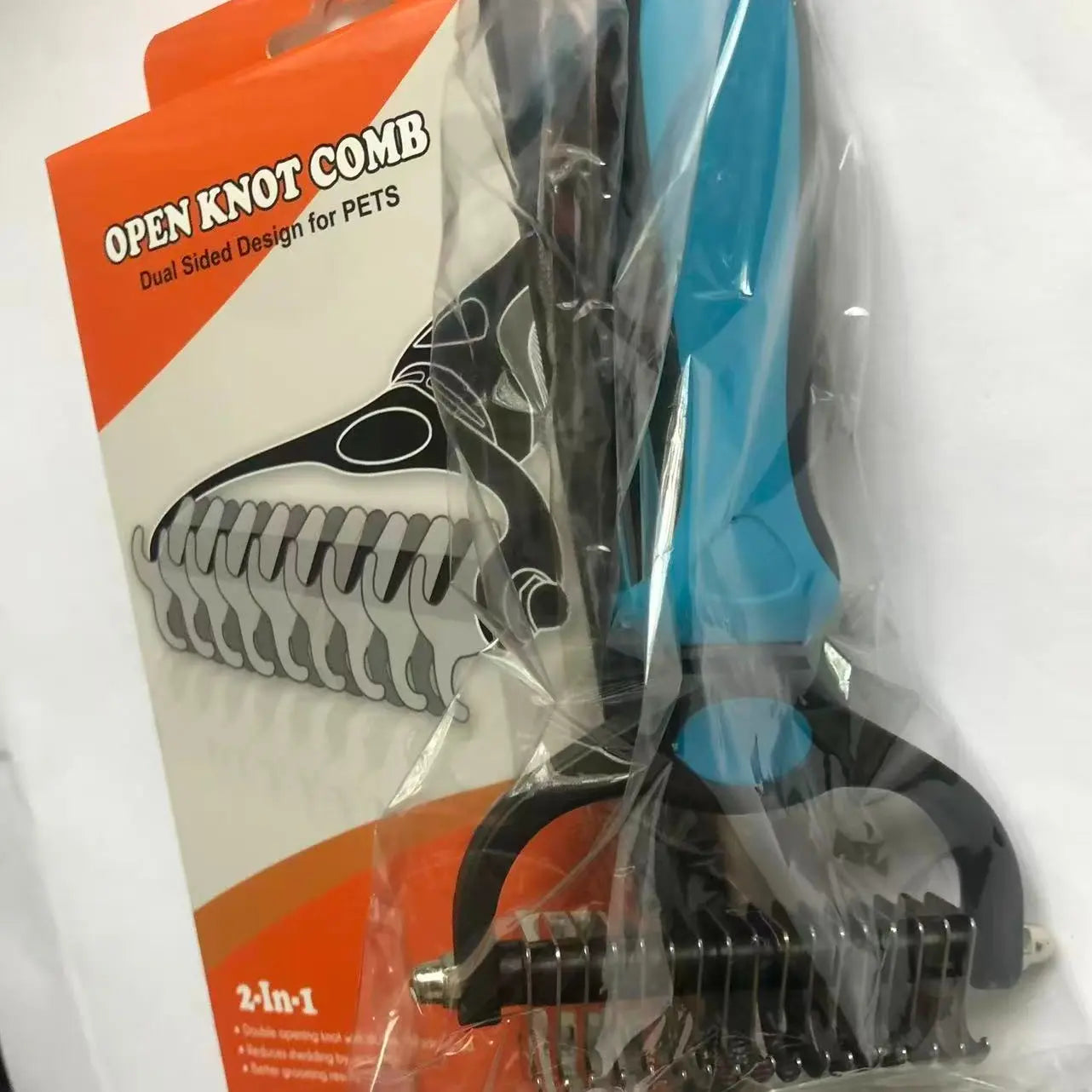 Transform Your Pet's Grooming Routine with the Dual-Sided Original Pet Grooming Brush - Effortlessly Reduce Shedding by 95% for Dogs and Cats!